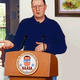Dave Stenulson addresses reporters at NAASA headquarters.